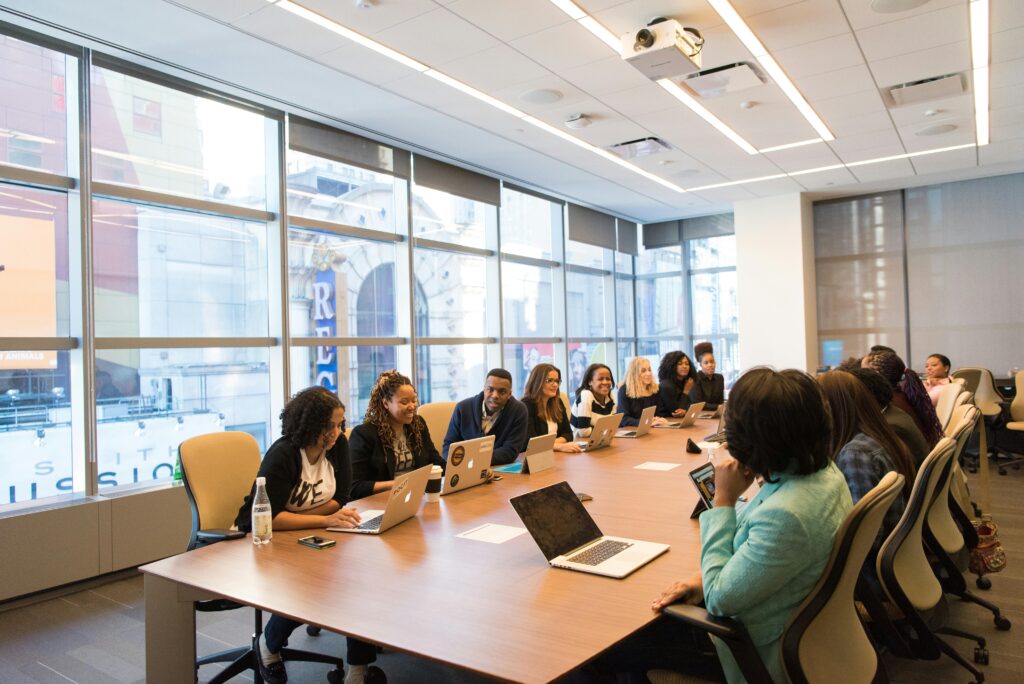 A group of people in a conference room.